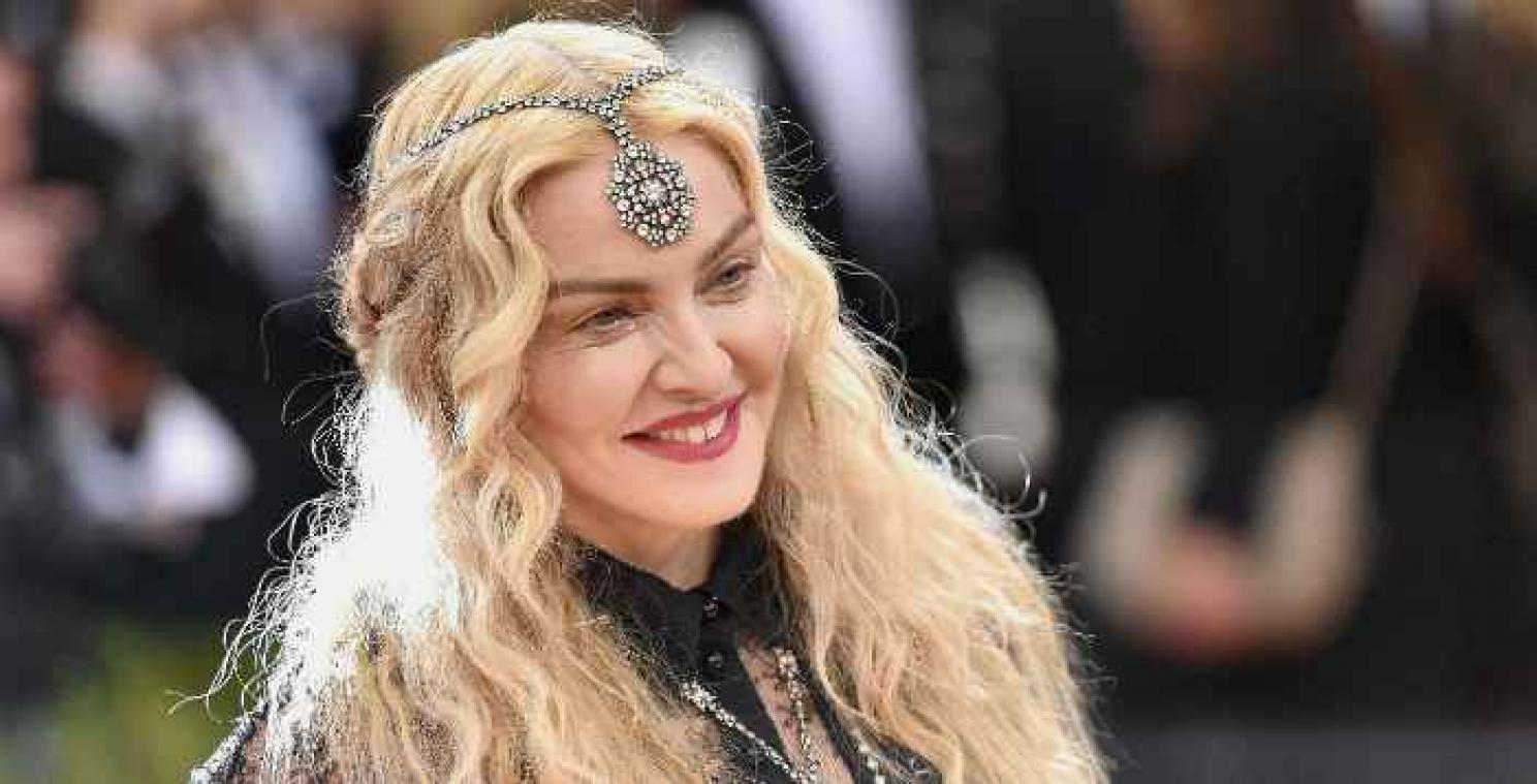 Duizenden fans van Prince willen geen eerbetoon door Madonna