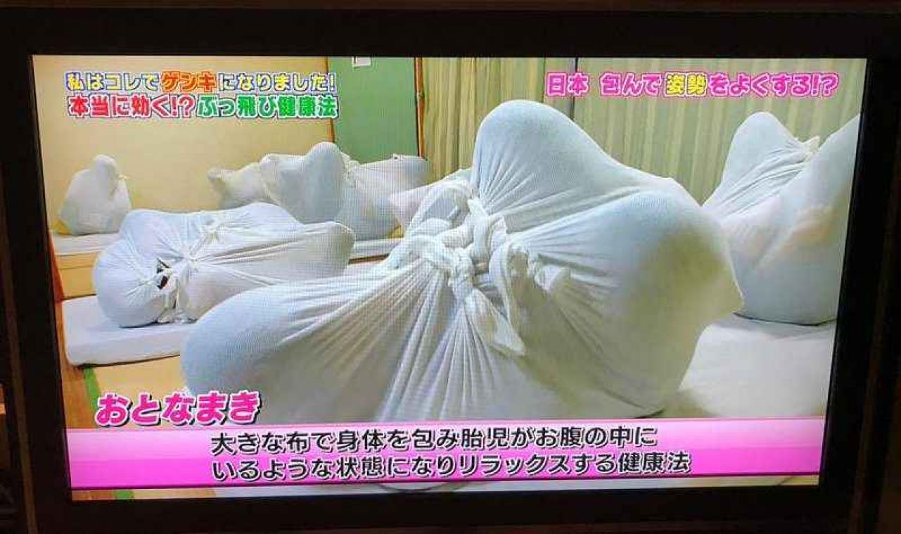 Dit is de nieuwste rage in Japan: jezelf laten vastknopen in een doek